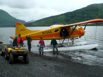 Floatplane dropping off Guests in the Wilderness near Kodiak, Alaska