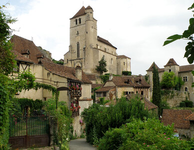 Village Saint-cirq-Lapopie with lane and church photo