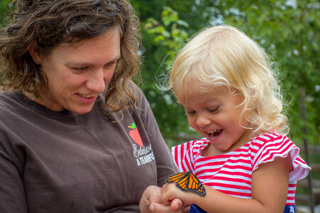 Mother and daughter with monarch butterfly-2