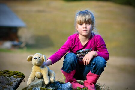 Girl stuffed animal nature