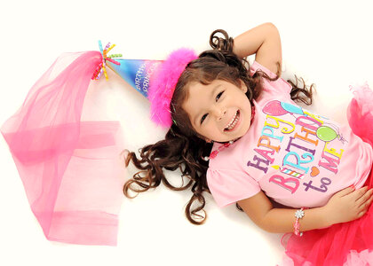 Birthday Girl in birthday t-shirt and hat photo