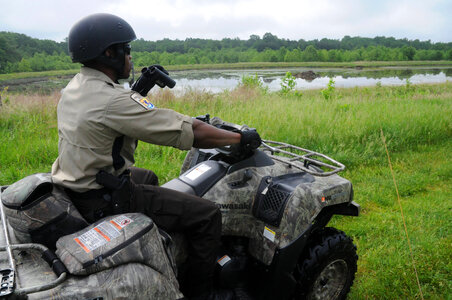 Refuge Law Enforcement Officer on ATV patrol - Free photos on creazilla.com