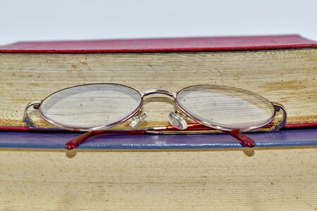 Books close-up eyeglasses photo