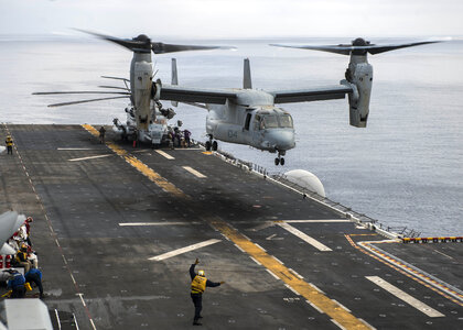 Sailors conduct flight operations on the flight deck photo