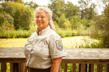 Employee on a dock at Nisqually National Wildlife Refuge-8