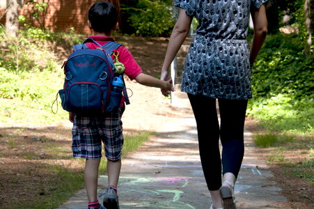 Going hand school child