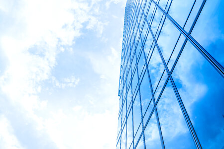3 Windows of Skyscraper Business Office with blue sky, Corporate building in city. photo