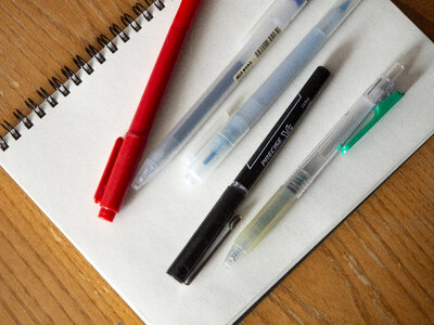 Pens on Notebook photo