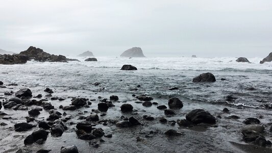 Gray rocks sea photo