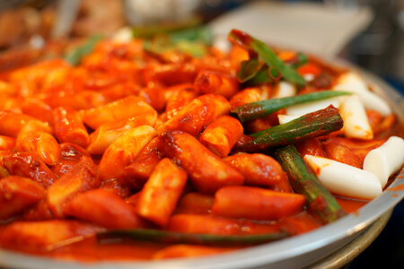 Tteokbokki, rice cakes with spicy gochujang sauce in South Korea photo