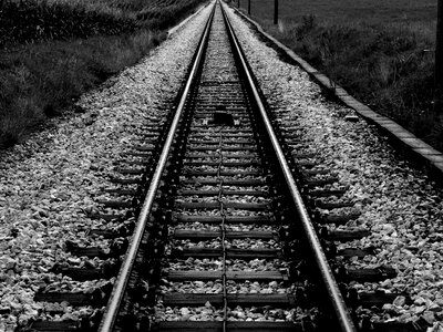 Vanishing point symmetry train tracks photo