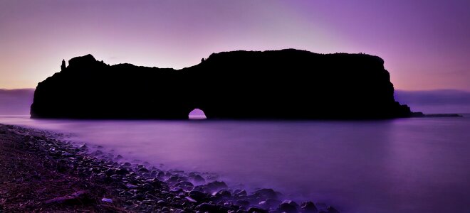 Mountain ocean purple sky photo