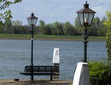 Bench electricity lake photo