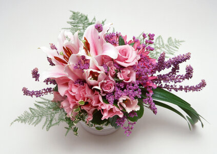 bouquet of roses and pink lilies photo