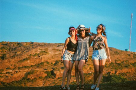 Three Joyful Young Girls on Summer Trip photo
