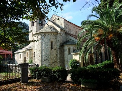 Italy romanesque church palm trees