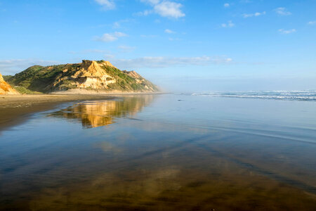 Baylys Beach landscape with water photo