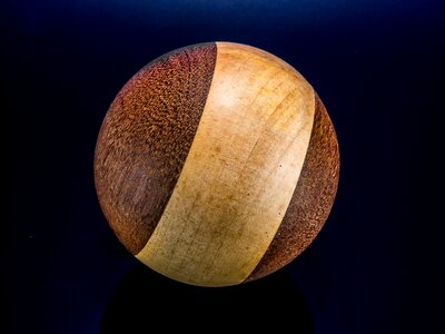 Wooden ball turned hand labor photo