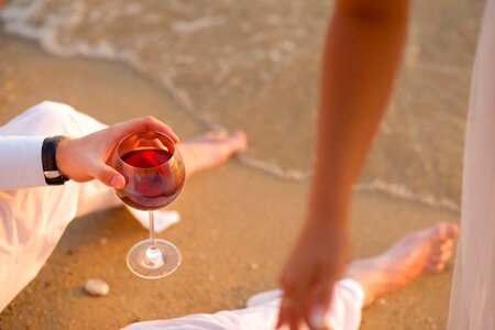 Couple Drinking Wine on Beach photo