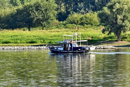 Danube fishing boat riverbank photo