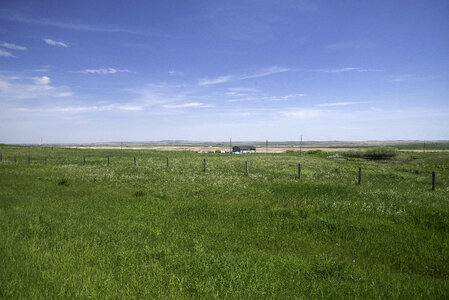 Grassland, Farm, and skies landscape in Alberta
