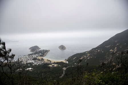 Town, Beach, ocean, and mountain landscape