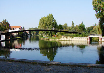 The Samarobriva footbridge towards the Saint-Pierre Park in Amiens, France photo