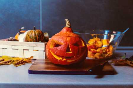 Happy Halloween! We preparing pumpkin to Halloween on kitchen photo