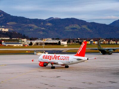 Aircraft airport salzburg white-red airplane