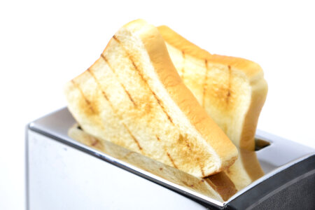 Bread toaster isolated on the white background photo