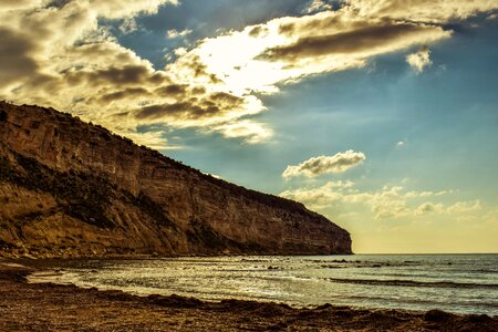 Beach cliff cloud photo