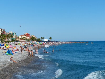 Tourists Relax on the beach photo