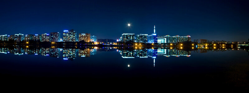 Nighttime Skyline over the water of Seoul, South Korea photo