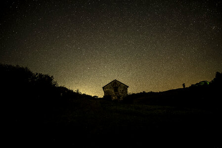 Stars over an old house photo