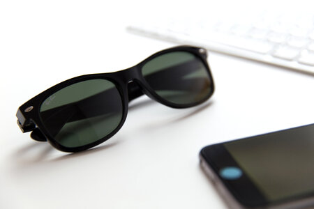 Sunglasses on Office Desk photo