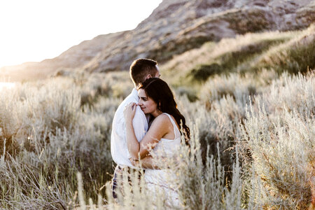 Couple Hugging Outdoors photo