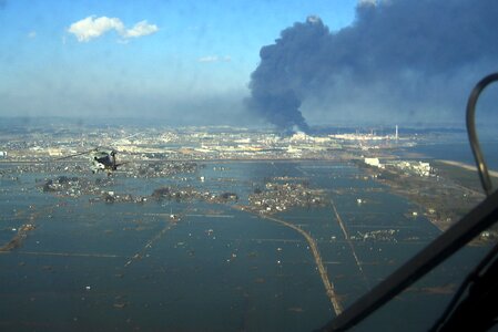 an 9.0 magnitude earthquake and a tsunami Japan