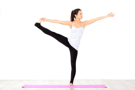 Sporty young woman doing yoga practice photo