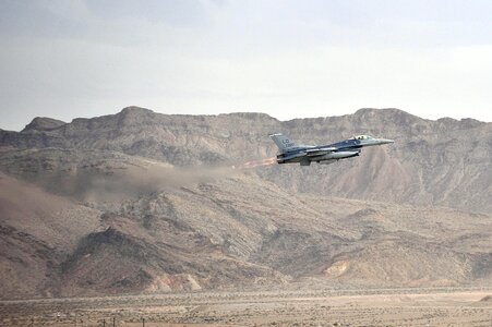 An F-16 Fighting Falcon takes off for a sortie training mission photo
