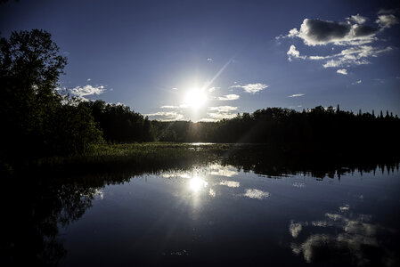 Bright Sun over Day lake in Chequamegon National Forest, Wisconsin photo