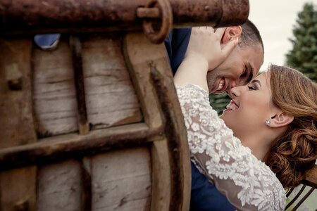 Smiling hugging bride photo