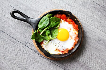 Egg with Spinach and Tomato for Breakfast photo
