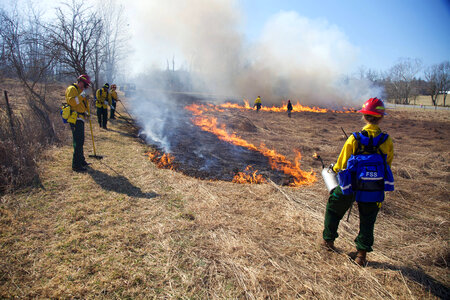 Firefighters near burn