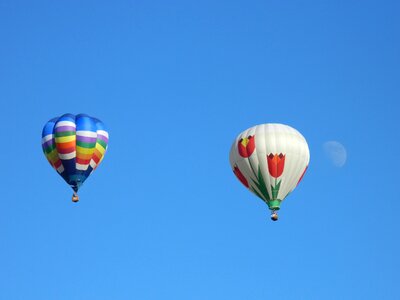 Blue sky floating balloon photo
