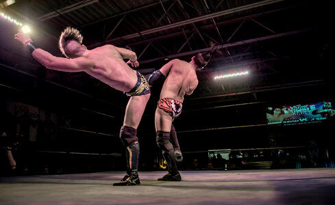 Two Men Battle for Control in Wrestling Match