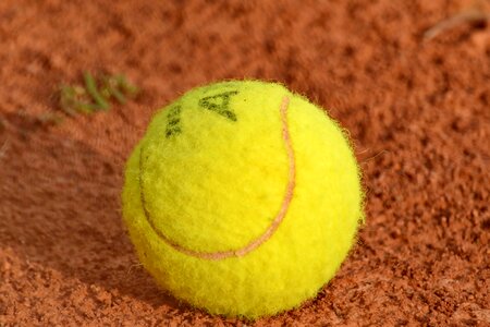 Ball greenish yellow tennis court photo