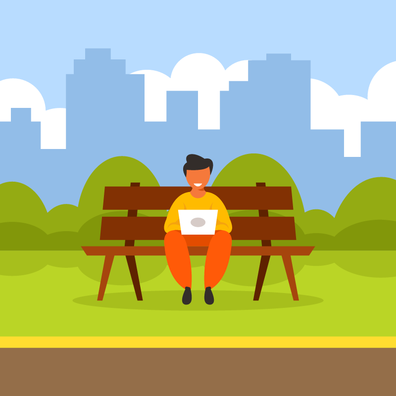 Teenager Using Laptop in Park