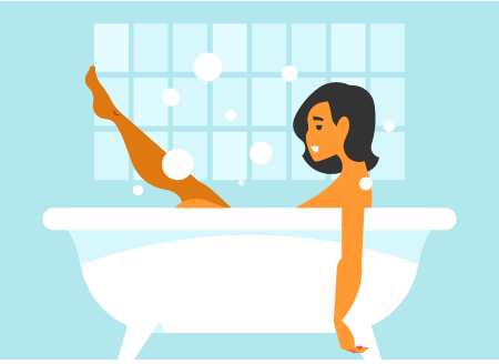 Woman Relaxing in Luxurious Bathtub