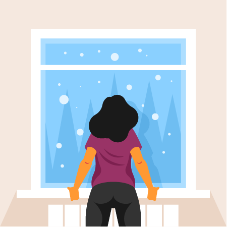 Woman Watching Snowfall from Indoors