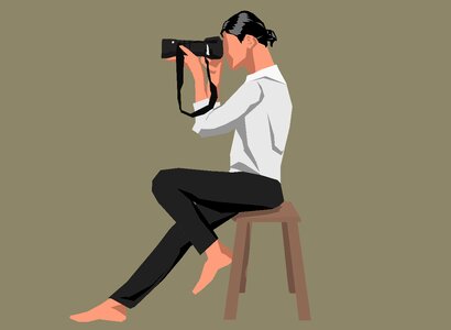 Adult take photo holding camera
